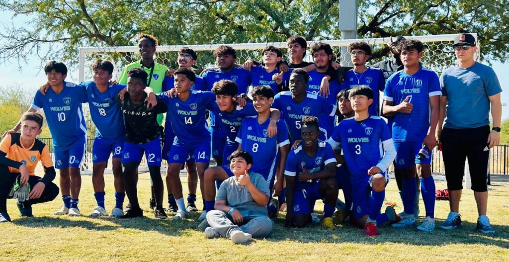 Empower College Prep’s boys soccer team poses for a group photo.